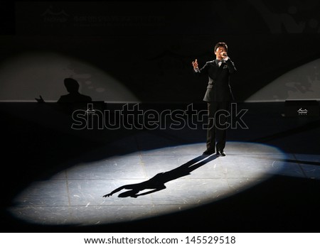 INCHEON - June 29:Unidentified male sing a song in the Opening Ceremony 4th Asian  Indoor&Martial Arts Games 2013 at Samsan World Gymnasium on June 29, 2013 in Incheon, South Korea.