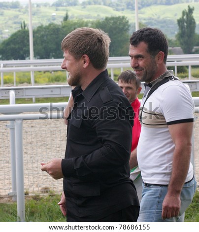 PYATIGORSK, RUSSIA - JUNE 5: (L - R) The President of the Chechen Republic Kadyrov and trainer Shaptukaev arrive at The race for the prize of the Avins Wuda on June 5, 2011 in Pyatigorsk, Caucasus, Russia.