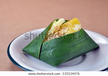 steamed rice dough with sweet coconut stuffing. Thai dessert. also called 