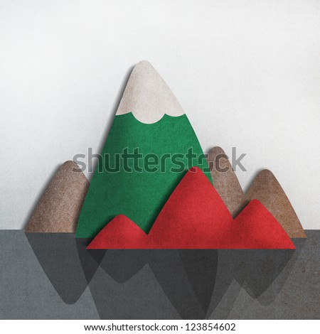 recycled paper craft stick on background, mountain on white background