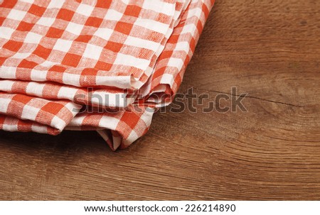 Tablecloth red and white checkered wavy  on board