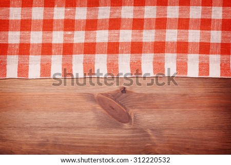 tablecloth red and white checkered wavy on board