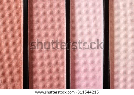 Brown and pink eye shadow, make up palette texture background