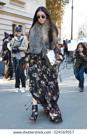 PARIS - OCTOBER 1: Woman poses for photographers before Chloe show, Paris Fashion Week Day 3, Spring / Summer 2016 street style on October 1, 2015 in Paris.