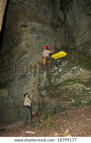 LOGAN, OH - OCTOBER 12: Park rangers extract an injured hiker from a deep ravine in the Cantwell Cliffs area of Hocking Hills State Park October 12, 2008