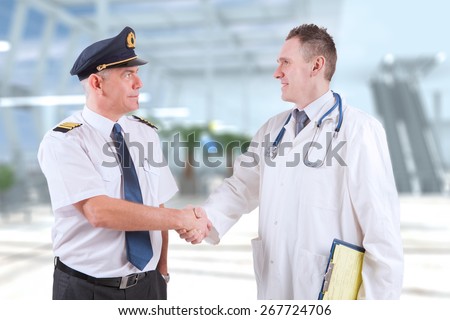 Commercial airplane pilot with doctor