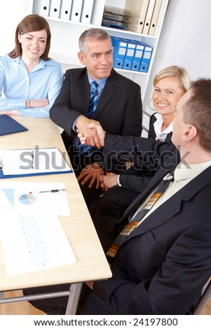 Business people make a deal, handshake