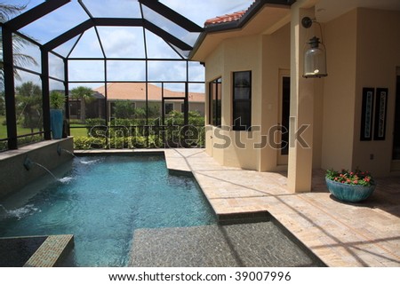 Screened in outdoor luxury swimming pool