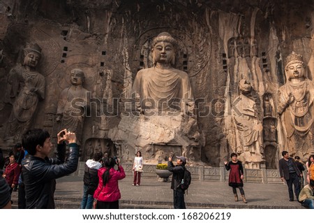 Luoyang - OCT 22: Visitors at Longmen grottoes on October 22, 2013.It is one of the four notable grottoes in Luoyang,Henan,China . A UNESCO World Heritage Site.