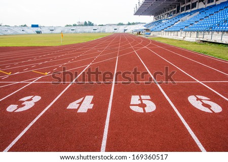 Athletic running track with number three, four,five and six in stadium