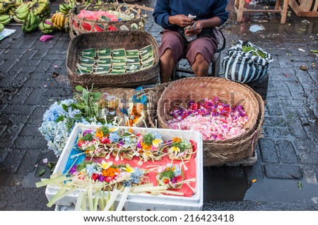 Bali, Indonesia, April 22,2010 :Commercial activities sell fruit ,flowers,sweet ,etc at Ubud market  in Ubud, Bali, Indonesia. Ubud Market is very famous among Balinese, located in center of Ubud.