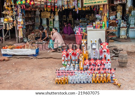 Yangon, Myanmar - March 14, 2011 : Vendor with Local souvenirs of Burmese local shops are mostly handicraft  in Yangon, Myanmar.
