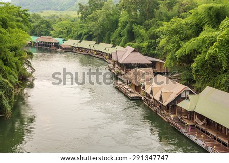 Kanchanaburi , Thailand - May 11,2015 : Thai people and tourist visiting The Forest Resort with  raft house at River Kwai in Kanchanaburi, Thailand.