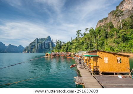 Surat Thani , Thailand - April 9,2015 : Lake and mountain landscape with kayak boat at Nangprai floating hut in Khao Sok lake, Surat Thani Province, Thailand.