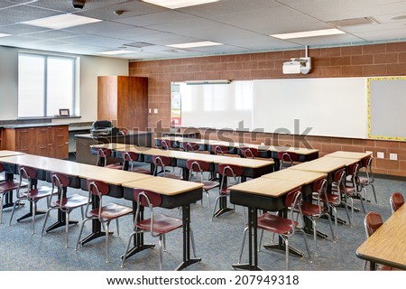 Idaho Falls, Idaho, USA  Nov. 13, 2013  A modern Elementary school room, with desks, and high tech teaching tools.