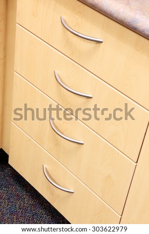 Modern cabinets in a new elementary school.  The cabinets are designed for function and economy.