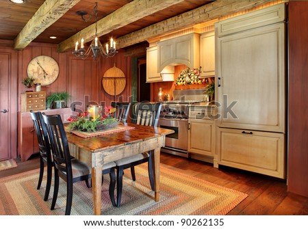 A modernized kitchen in a primitive colonial style reproduction home.  The styling is authentic primitive colonial, with modern amenities added to make the home functional and comfortable.