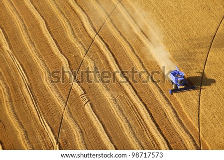 A wheat field being harvested