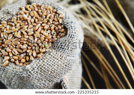 Bag with grain and ears of wheat