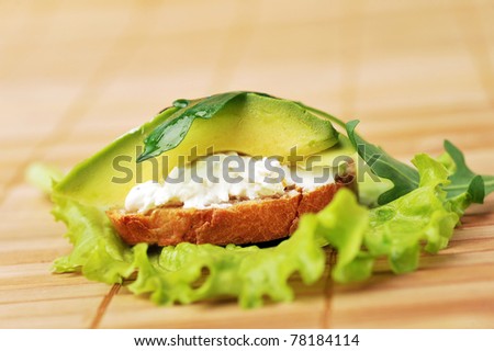 beautiful and delicious sandwich of toasted bread, avocado and spinach