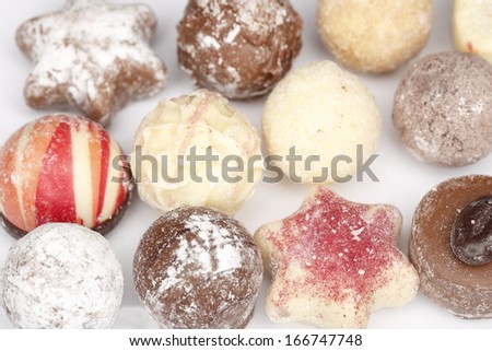 various fine chocolates as background - sweet food