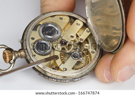 repairing old clock work,old mechanical watch