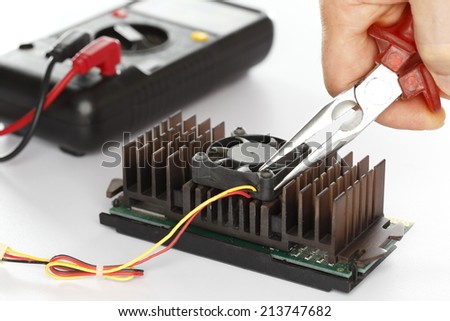 electricity test on electrical component with tools