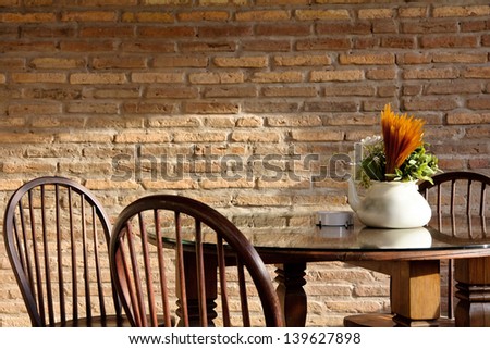 vintage chair and table with flower