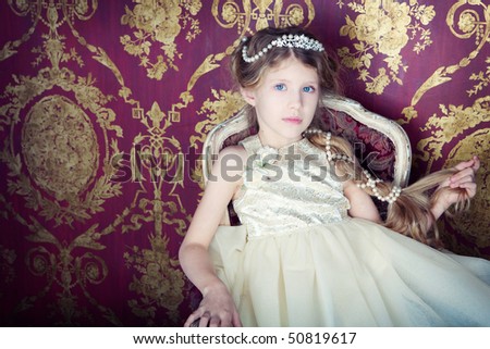 beautiful little girl in princess dress with long hair, studio set