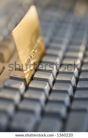 Credit card on computer keyboard