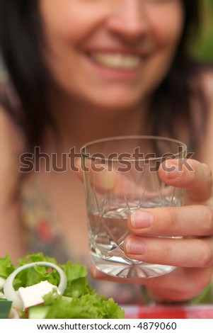 Glass of water in hand