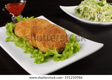 Chicken cutlet breaded in lettuce leaves
