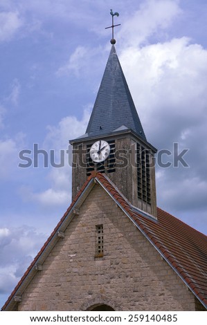 Clock tower of the medieval church in the Champagne region in France