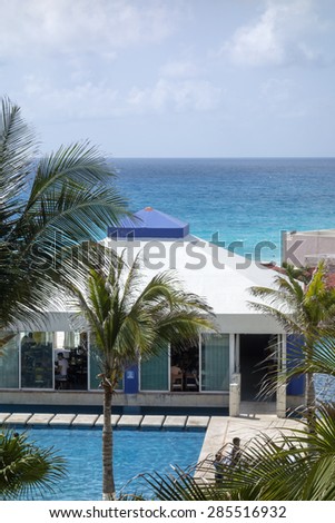 CANCUN, MX - May 17, 2015: People dining and enjoying beautiful ocean view in a restaurant at Solymar Beach and Resort hotel, Cancun, Mexico