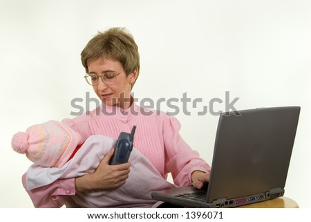 Mother Multitasking - Watching Baby and working on Laptop and holding Phone