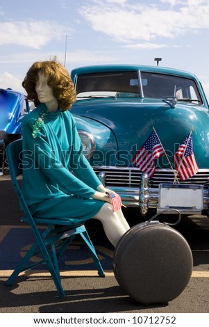 Artificial woman near Kaiser-Frazer car at car show; Phoenix, Arizona