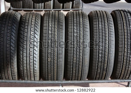 Brand new tires stacked up on display ready for sale