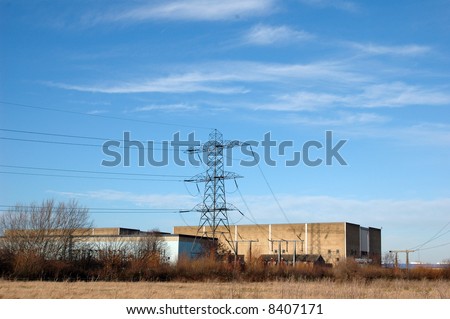 industrial estate in east london on a cold sunny winter\'s day against the blue sky