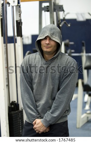 Man resting after gym training. All this shots  done during exercises,  no posing.