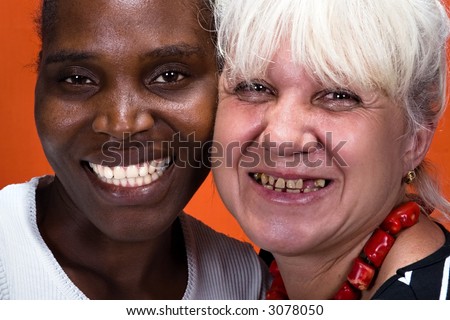 Dentistry nice smile hey, Caucasian and African American woman teeth compare.