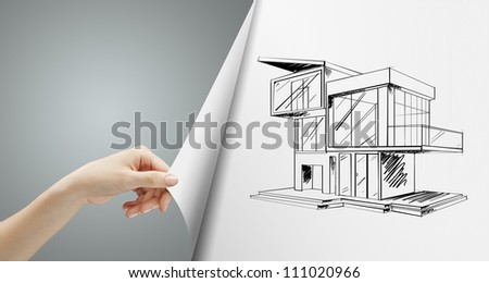 women hand turns gray page with cottage