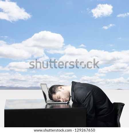 Businessman sleep at laptop on background of nature