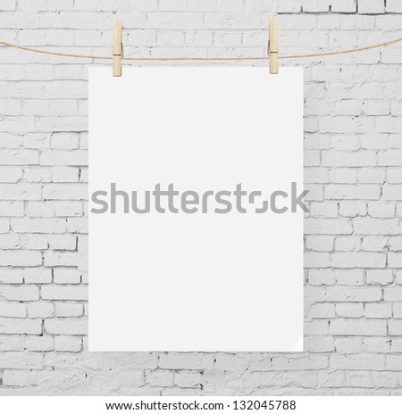 brick wall and blank poster