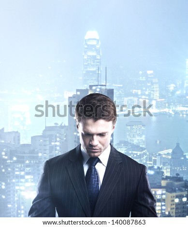 businessman thinking and city on background