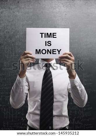 businessman holding poster with  time is money