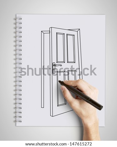 hand drawing door in  note pad