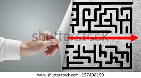 hand turns gray page with maze