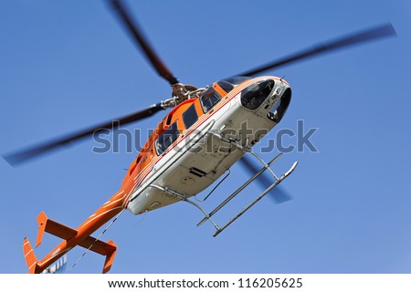 KASHMIR, INDIA - DECEMBER 16:View from below of helicopter coming in to land on December 16 2011 Katra heliport Kashmir India. They ferry pilgrims to Vaishno Devi temple on Trikuta mountains