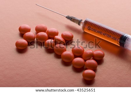 object on red - Red Tablet and syringe on red