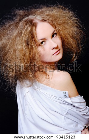 Sensual woman with fluffy hair.